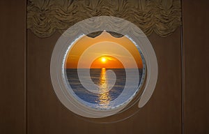 Beautiful Sunset Seen Through a Ship Porthole