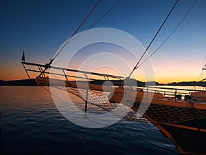 Beautiful sunset in Sibenik, Croatia, sailing ship