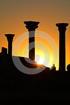 Beautiful sunset with silhouette of ancient columns at Chersonese of Taurida, Crimea.