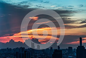 Beautiful sunset sky above clouds with dramatic light, Beautiful blazing sunset landscape