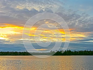 Beautiful sunset sky over the river reach photo