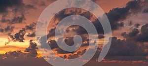 Beautiful sunset sky with some clouds