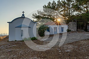 Beautiful sunset sun over the Monastery of Panagia Eleousa, Ithaka Island, Greece