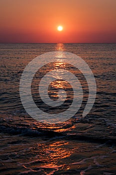 Beautiful sunset sunrise beach with pink sky and pier. Travel, relax and meditation concept