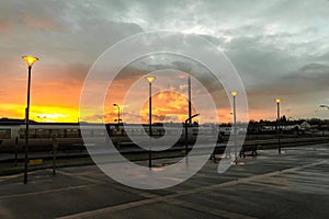 Beautiful sunset on a train station in France photo