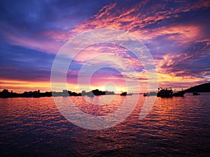 Beautiful sunset view along the beach with blue sky.