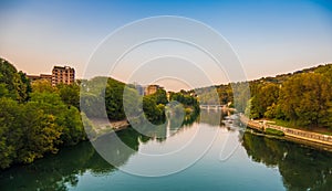 Beautiful sunset view of the arch bridge over the river Po in the city of Turin, Italy