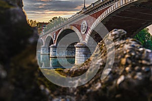 Beautiful sunset view of the arch bridge over the river Po in the city of Turin, Italy