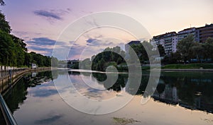 Beautiful sunset view of the arch bridge over the river Po in the city of Turin, Italy