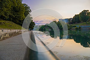 Beautiful sunset view of the arch bridge over the river Po in the city of Turin, Italy