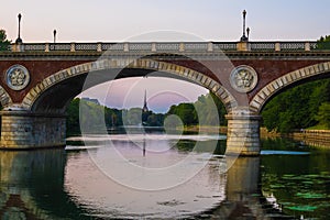 Beautiful sunset view of the arch bridge over the river Po in the city of Turin, Italy