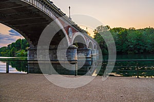 Beautiful sunset view of the arch bridge over the river Po in the city of Turin, Italy