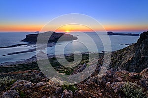 Beautiful sunset view of Cape Tigani and Gramvousa islet from Balos beach, Crete, Greece.