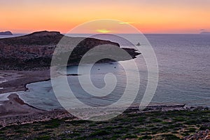 Beautiful sunset view of Cape Tigani and Gramvousa islet from Balos beach, Crete, Greece.