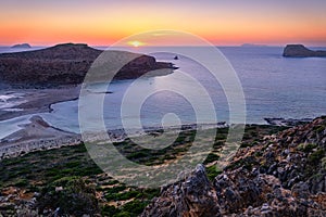 Beautiful sunset view of Cape Tigani and Gramvousa islet from Balos beach, Crete, Greece.