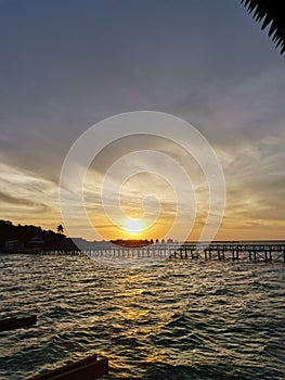 Beautiful sunset view in Mabul Island before heading to sunset dive Mabul Island, Semporna. Sabah, Malaysia. Borneo. The Land Belo