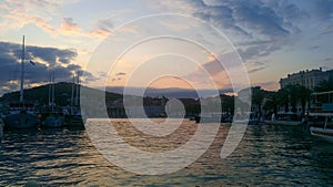 Beautiful sunset view over the port. Split seaport is located in the middle of Croatia, on the Adriatic coast, in a cozy bay,