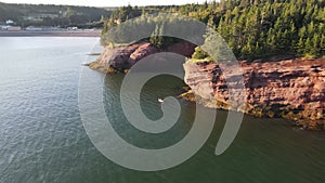 Beautiful sunset view of St Martins Sea Caves at Fundy national park Canada