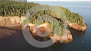 Beautiful sunset view of St Martins Sea Caves at Fundy national park Canada