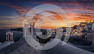 Beautiful sunset view to the picturesque village Oia on the Greek island of Santorini