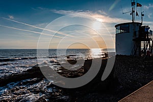 Beautiful Sunset on Welsh landscape , Porthcawl harbour with the watch tower.