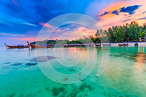 Beautiful sunset on white sand beach and Clear water to see the coral reef at Koh Lipe island in Satun,Thailand