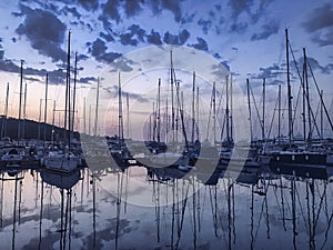 Beautiful Sunset with Yachts and Calm Sea in Marina