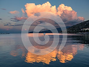 Beautiful sunset and yachts in the Ionian Sea on the island of Kefalonia in Greece