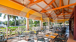Beautiful sunshine afternoon and lunch alfresco an open dining room at a resort in Varadero, Cuba.