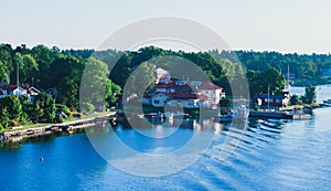 Beautiful super wide-angle aerial view of Stockholm archipelago skerries and suburbs with classic sweden scandinavian designed cot