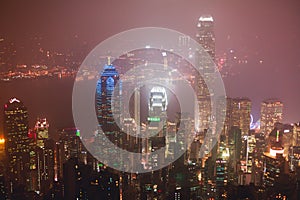 Beautiful super wide-angle summer aerial view of Hong Kong island skyline, Victoria Bay harbor, with skyscrapers, blue sky