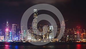 Beautiful super wide-angle summer aerial view of Hong Kong island skyline, Victoria Bay harbor, with skyscrapers, blue sky