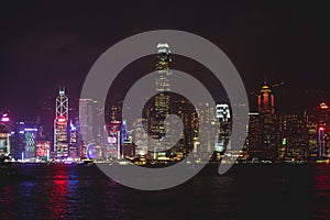 Beautiful super wide-angle summer aerial view of Hong Kong island skyline, Victoria Bay harbor, with skyscrapers, blue sky