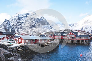 Beautiful super wide-angle winter snowy view of fishing village A, Norway, Lofoten Islands, with skyline, mountains, famous fishin