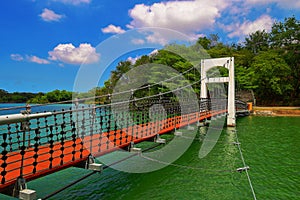 The beautiful suspension bridge connecting the small islands in the lake at Chengching Lake