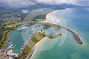 The beautiful sweeping coastline is cloaked in mist.