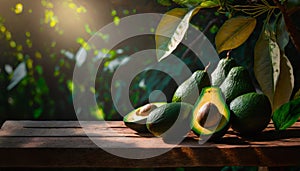 Beautiful sweet avocadoes on a wooden table in the garden