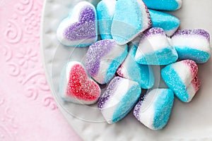 Beautiful sweet hearts, blue, red and white colorful marmalade candies