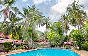 Beautiful swimming pool in public tropical resort , Phuket