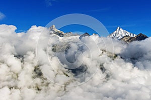 Beautiful Swiss Alps landscape with mountain in clouds view in summer, Zermatt, Switzerland