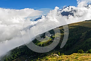 Beautiful Swiss Alps landscape with mountain in clouds view in summer, Zermatt, Switzerland
