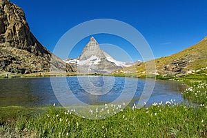 Beautiful Swiss Alps landscape with Stellisee lake and Matterhorn mountain reflection in water, summer mountains view, Zermatt