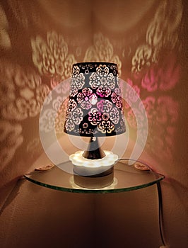 A beautiful table lamp with uniqe tarkish disian  it bed room romantic atmosphere