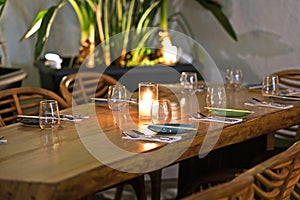 Beautiful table set in an elegant restaurant of Chora in Mykonos