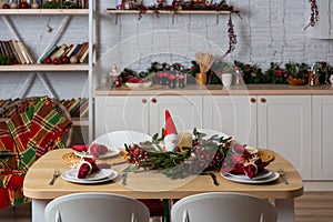 Beautiful table setting with Christmas decor in living room