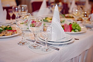 Beautiful table setting for a wedding banquet in restaurant