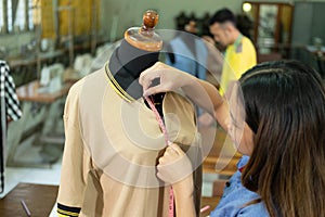 Beautiful tailor women when high neck button shirt with tape measure