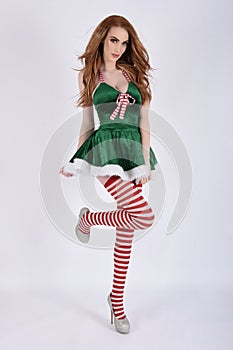 Beautiful, Tall, Slim, Busty Redhead Model dressed as a Sexy Elf