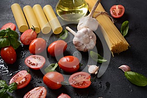 Beautiful tasty colorful pattern of Italian pasta, tomatoes and Fresh Basil.