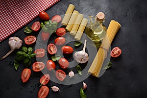 Beautiful tasty colorful pattern of Italian pasta, tomatoes and Fresh Basil.